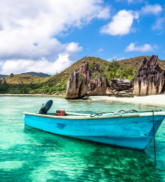 Boat on the beach at Curieuse Island, Seychelles