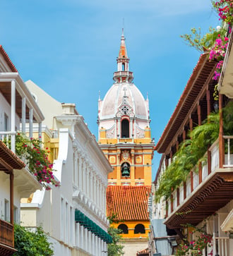 Balconies and cathedral in Cartagena, Colombia