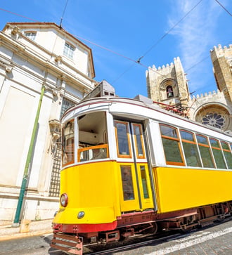Tram outside Lisbon cathedral, Portugal