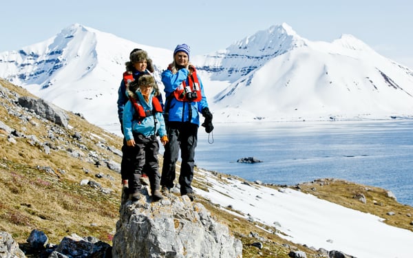 family in svalbard on an expedition cruise with hurtigruten