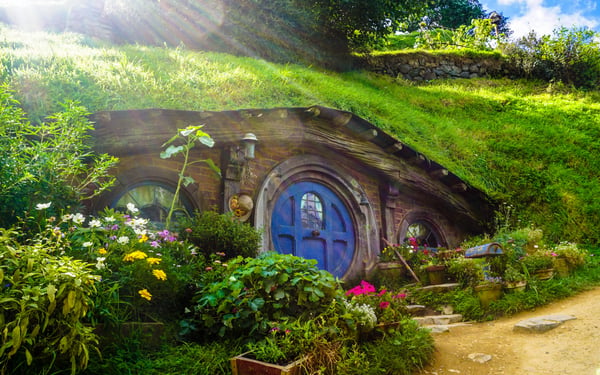 Hobbiton in New Zealand, one of the iconic film locations you can visit on a cruise holiday