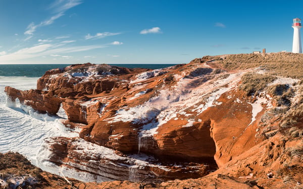 Borgot lighthouse on the red cliffs of the Magdalen Islands, Canada