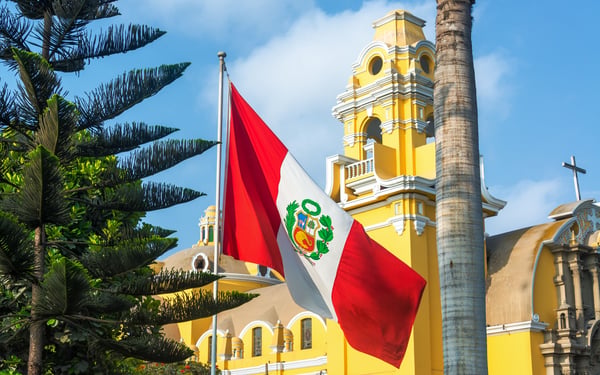 Flag and church in Lima, Peru