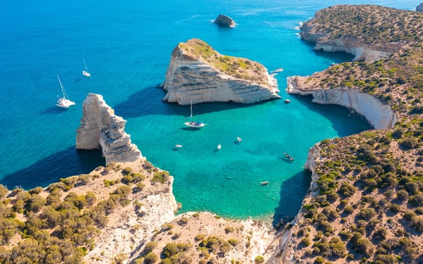 Kleftiko Bay on Milos island in Greece, a popular stop on a small ship greek islands cruise