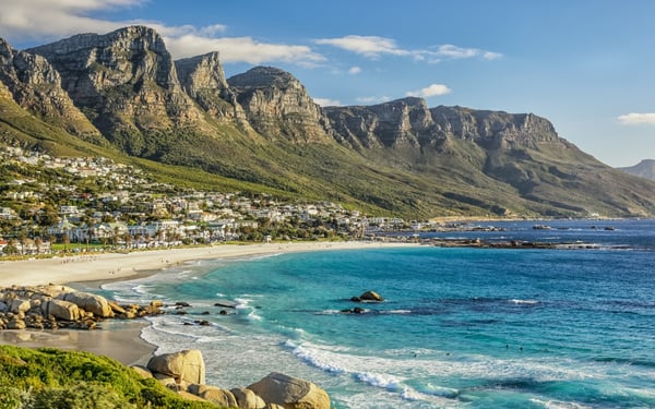 A beach in Cape Town with the Twelve Apostles in the background