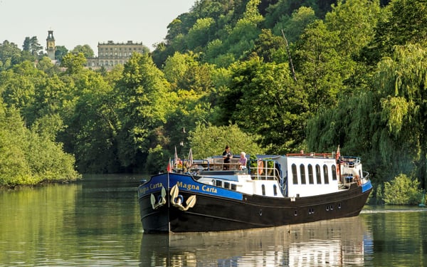 European Waterways' barge Magna Carta sailing the Thames