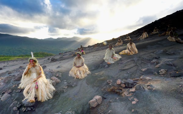 Islanders on Mount Yasur in Tanna, Vanuatu, one of the most amazing Pacific islands you can visit on an expedition cruise