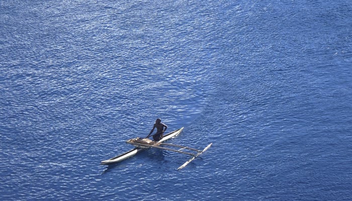 Traditional canoe off Garove island, Papua New Guinea