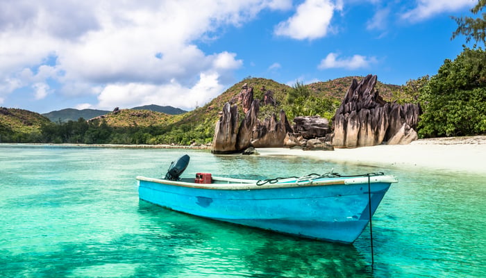 Boat on the beach at Curieuse Island, Seychelles