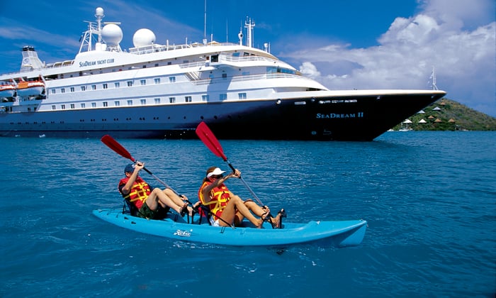 Guests kayaking with SeaDream Yacht Club