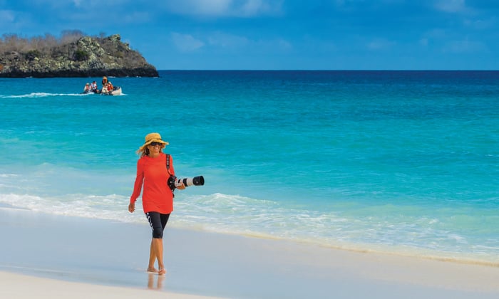 woman with camera in the galapagos with national geographic-lindblad expeditions