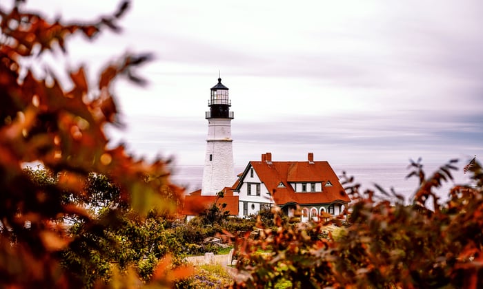Lighthouse in Portland, Maine in the autumn, the best time to cruise canada and new england