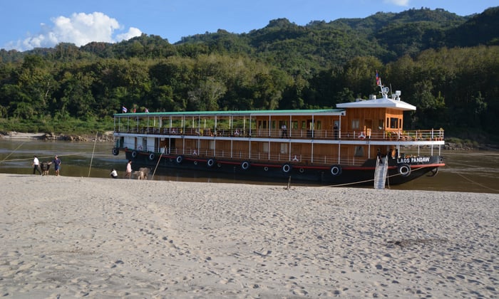 Laos Pandaw moored by a sandbank on the Upper Mekong