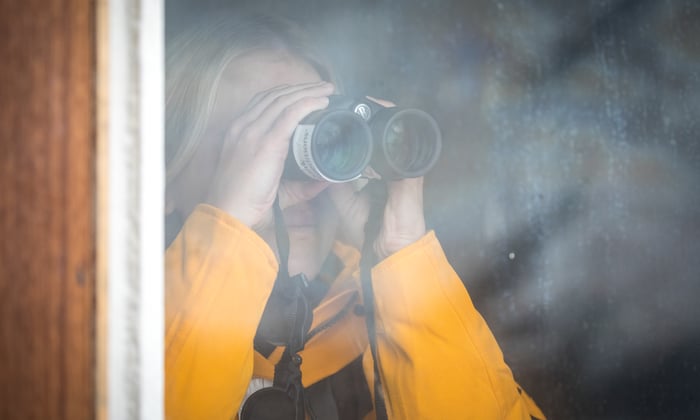 Using binoculars on a Quark Expeditions cruise