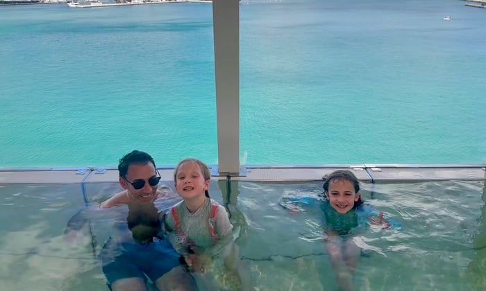 Alex and his daughters in the family-friendly whirlpool on Explora I