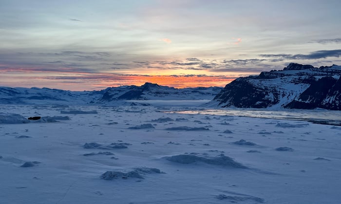 Sunset on the Blosseville Coast in Greenland sailing on Le Commandant Charcot
