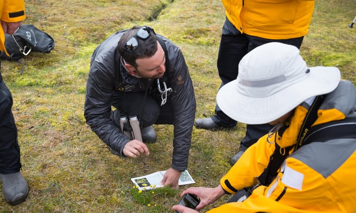Guests making scientific observations on a Quark Expeditions cruise to the Arctic