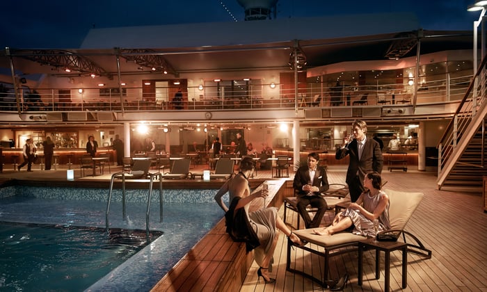 Group of friends enjoying cocktails by the pool on Silver Muse