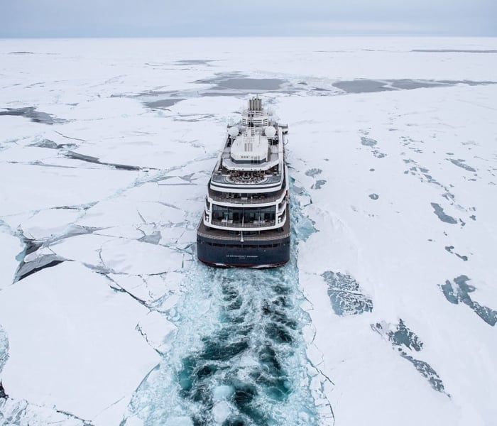 Le Commandant Charcot pushing through the ice 
