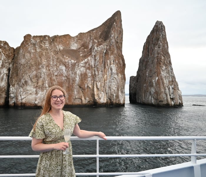 Louise on deck sailing around Kicker Rock, Galapagos Islands