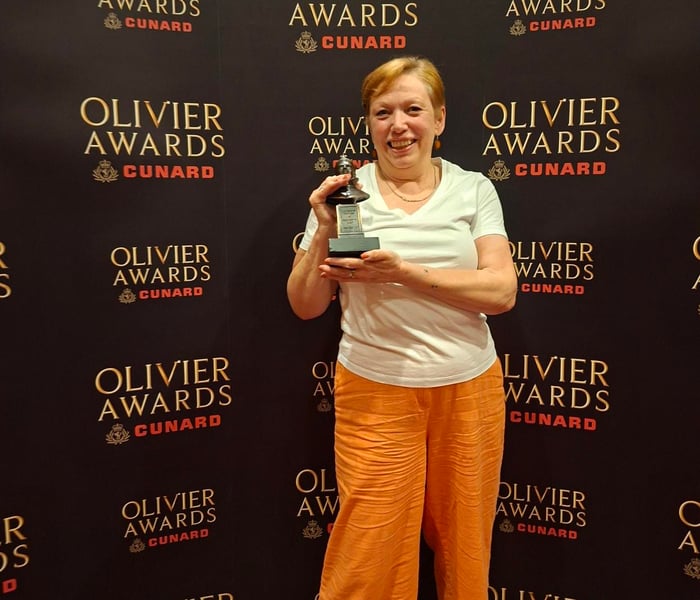 Cathy Holding her Olivier Award