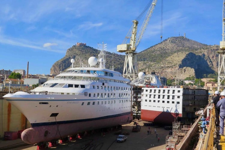 Windstar's Star Breeze being stretched in Palermo (photo by Anne Kalosh)