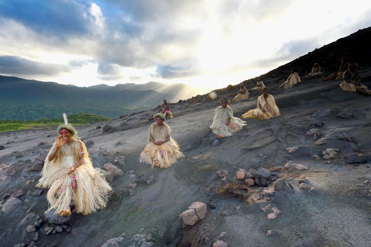 Islanders on Mount Yasur in Tanna, Vanuatu, one of the most amazing Pacific islands you can visit on an expedition cruise