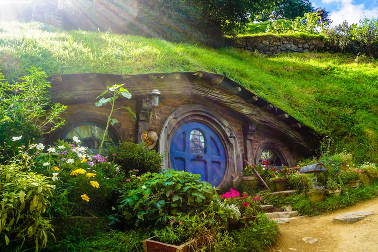 Hobbiton in New Zealand, one of the iconic film locations you can visit on a cruise holiday