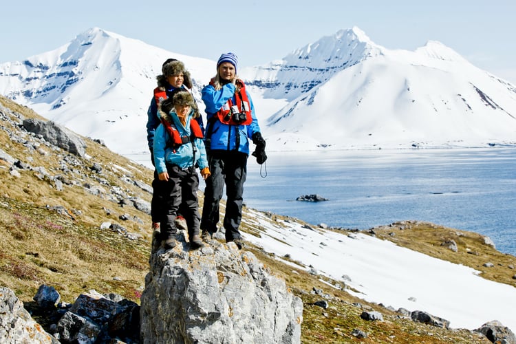 family in svalbard on an expedition cruise with hurtigruten