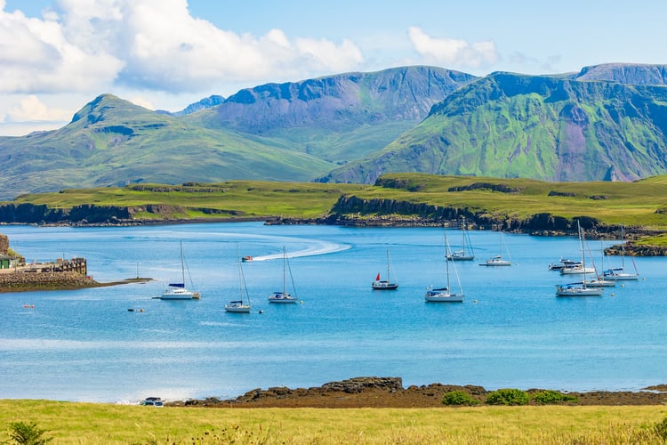 Isle of Canna, Inner Hebrides in Summer where you can visit on a scotland small ship cruise