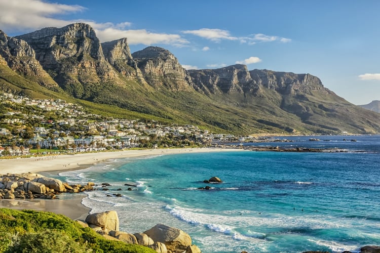 A beach in Cape Town with the Twelve Apostles in the background