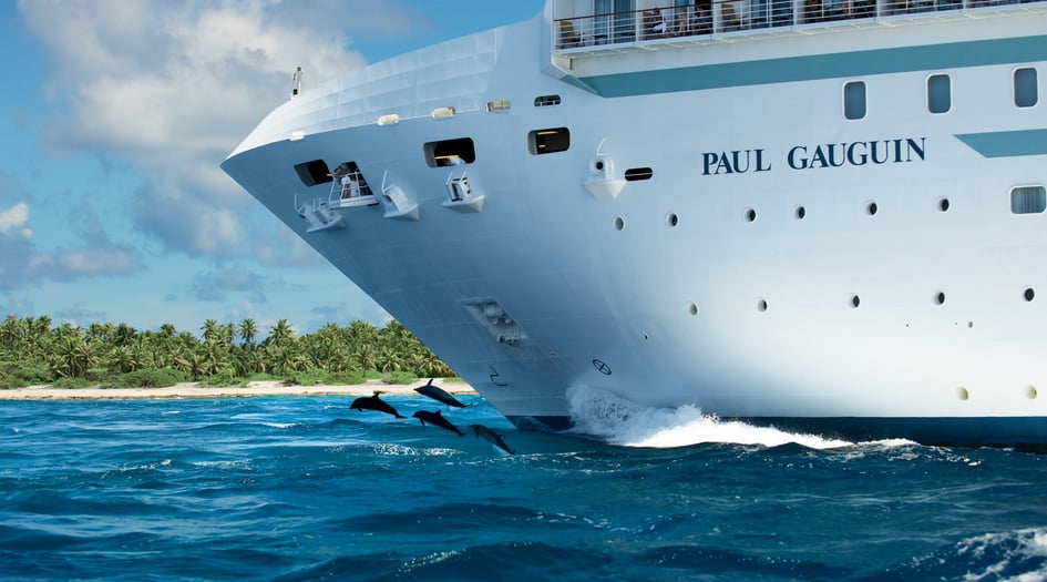 MS Paul Gauguin and dolphins in Rangiroa