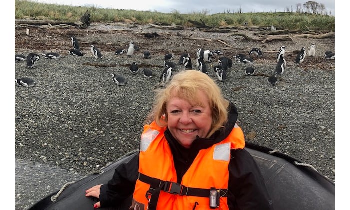 Sharon at Tucker Islets with Magellanic penguins
